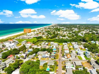 an aerial view of a town next to the beach at 19224 Delmar Dr in Panama City Beach