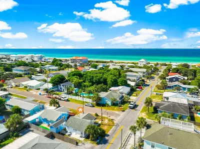 an aerial view of a small town next to the ocean at 19224 Delmar Dr in Panama City Beach