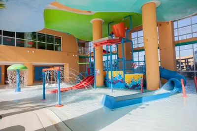 a playground in front of a building at Splash 1701E in Panama City Beach