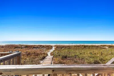 a view of the beach from a deck at Memories at the Seashore in Panama City Beach