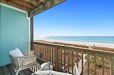 a balcony with a view of the beach at Memories at the Seashore in Panama City Beach