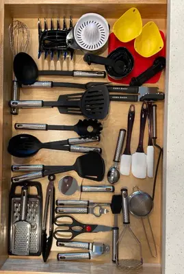 a drawer filled with lots of kitchen utensils at Livin Laguna Loca in Panama City Beach