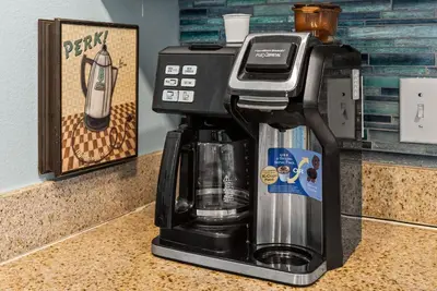 a coffee maker sitting on top of a counter at 3 BD Gulf View Resort Condo! 5 Pools! Beach Access by Dolce Vita Getaways in Panama City Beach