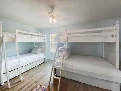 two bunk beds in a room with a ceiling at On the Beach l Beach Front l Steps to the Beach l 2 Bikes Included in Inlet Beach