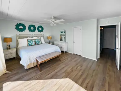 a bedroom with a bed and a ceiling fan at On the Beach l Beach Front l Steps to the Beach l 2 Bikes Included in Inlet Beach