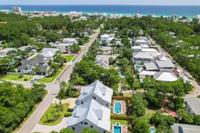 an aerial view of a residential neighborhood with houses at Sand Wand l 5 Beds l 5 and half Bath l Private Pool l Walk to Beach l Seagrove Beach 30A in Santa Rosa Beach