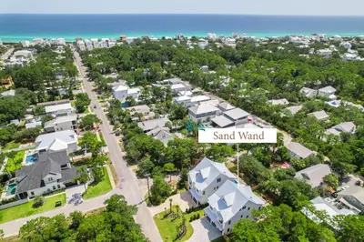 an aerial view of a neighborhood with houses and the ocean at Sand Wand l 5 Beds l 5 and half Bath l Private Pool l Walk to Beach l Seagrove Beach 30A in Santa Rosa Beach