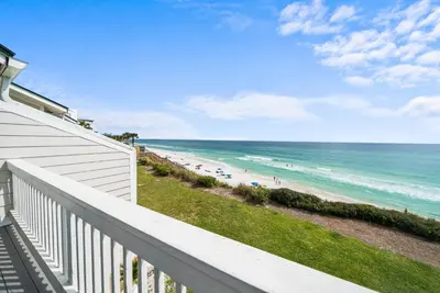 a view of the beach from the balcony of a beach house at Seacrest 6 l Beachfront l Bike to Alys and Rosemary Beach in Seacrest