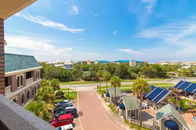arial view of a parking lot at a resort at The Flipside 30A l Heated Community Pool and Hot Tub l Steps to Rosemary Beach in Rosemary Beach