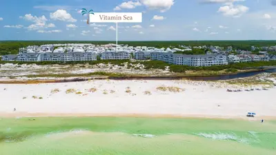 an aerial view of a resort on the beach at Vitamin Sea l Beachfront l 4 Bikes Included in Inlet Beach
