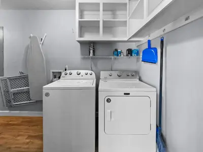a kitchen with two washing machines in a room at Lagerheads l Beach Views l Private Pool l Dog Friendly l Includes 4 Bikes in Inlet Beach