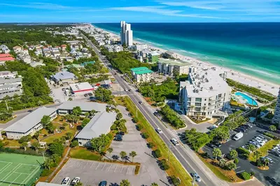 an aerial view of a city and the ocean at Paradise 2205 in Santa Rosa Beach