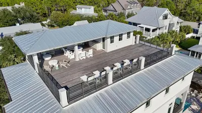 an aerial view of a house with a large deck at Anchors Aweigh in Seacrest