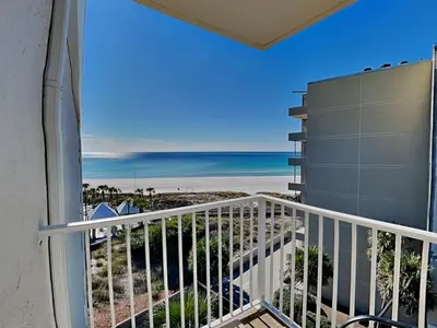 a balcony with a view of the beach at Dunes of Panama #B501 in Panama City Beach