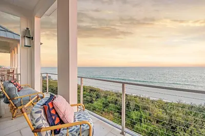 a balcony with a view of the ocean at Gulf Royale 30A in Inlet Beach