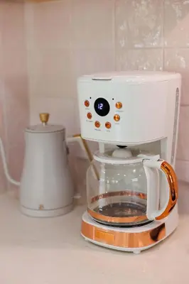 a coffee maker sitting on top of a counter at Sol Haus Stylish Coastal Retreat 3 Blocks to Beach Screened Porch Fast Wi Fi in Panama City Beach