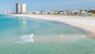 an aerial view of a beach with buildings in the background at WALK TO BEACH Perfect Family Getaway Sleep 6 in Panama City Beach