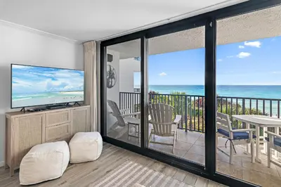 a living room with a view of the ocean at Be Still 30A in Santa Rosa Beach