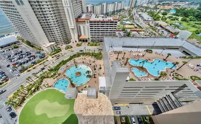 an aerial view of a resort with two pools at Beach-Ready Resort Condo! Pools & Walk to Beach by Dolce Vita Getaways in Panama City Beach