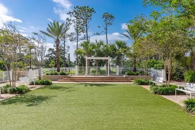 a park with benches and a gazebo at Beach-Ready Resort Condo! Pools & Walk to Beach by Dolce Vita Getaways in Panama City Beach