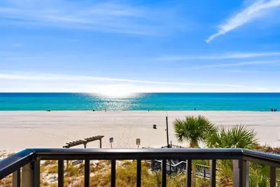 a view of the beach from a balcony at Amazing Gulf Views! Resort! Beach Chair Service by Dolce Vita Getaways PCB in Panama City Beach