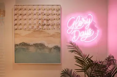 a neon sign on a wall with a sign for glory days at Glory Days 30A - Pool, Bikes & Close Beach Access in Inlet Beach
