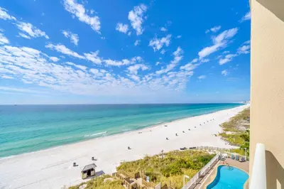 a view of the beach from the balcony of a condo at Seychelles 602 by Emerald Coast Retreats in Panama City Beach