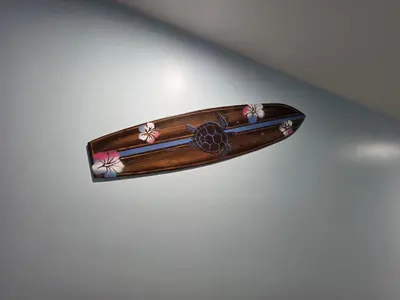 a wooden object with flowers on a wall at Beautiful gulf front condo with grill on balcony in Panama City Beach