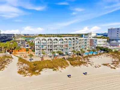 an aerial view of a hotel on the beach at The Ambassador - Unit C5 - Studio King - On Pool Deck in Panama City Beach
