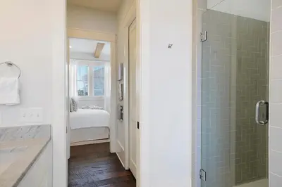 a bathroom with a walk in shower and a shower at Driftwood - Vacation Home Near the Beach with a Large Outdoor Area in Santa Rosa Beach