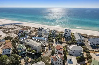 an aerial view of a resort near the beach at Hermosa Manor - Luxury Vacation Rental House Near the Beach with Private Pool Area & Gulf Views in Santa Rosa Beach