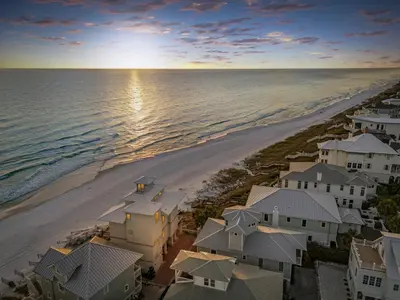 an aerial view of a beach with houses and the ocean at Sea Grove - Beachfront, Ocean Views & Balcony in Santa Rosa Beach