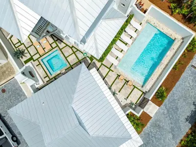 an overhead view of a swimming pool on a house at YOLO Cottage & Carriage in Rosemary Beach
