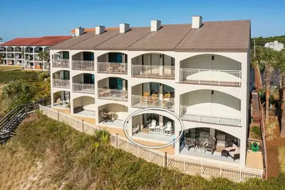 an aerial view of a large apartment building with balconies at Dune Villas 2A - Gulf Front Vacation Condominium with Shared Pool in Santa Rosa Beach
