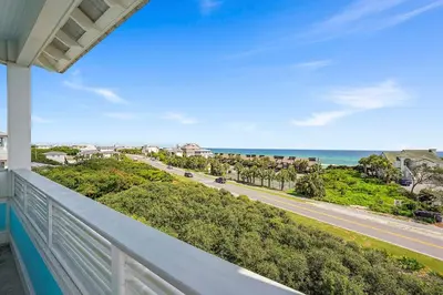 a view of the ocean from the balcony of a house at The Sassy Seagull - 30A Beach House with Ocean Views in Seacrest