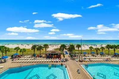 a view of two pools and the beach at Summit 1417 Beach Resort - Amazing Balcony Views in Panama City Beach