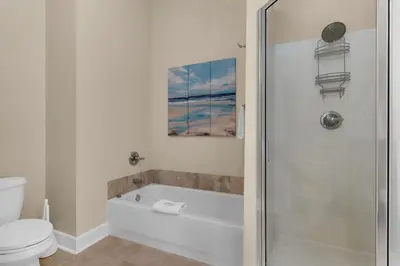 a bathroom with a bath tub and a toilet at 30A-Sea La Vie-Seagrove Highlands 2302 in Santa Rosa Beach