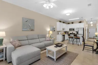 a living room with a couch and a table at 30A-Sea La Vie-Seagrove Highlands 2302 in Santa Rosa Beach