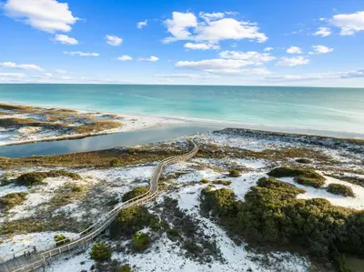 an aerial view of a beach with a road and the ocean at Sea Glass Cottage by 30A Escapes in Watersound Beach
