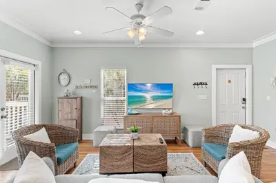 a living room with a couch and chairs at Beach Therapy in Seacrest