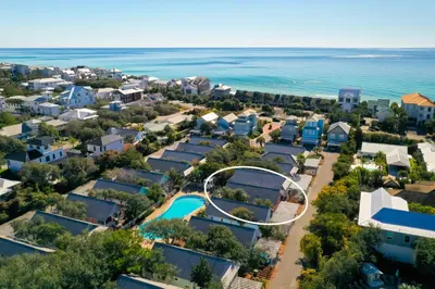 an aerial view of a residential neighbourhood with a swimming pool at Beach Therapy in Seacrest