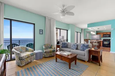 a living room with a couch and chairs and a balcony at Origin 1602 -PENTHOUSE- 3 Bedroom- Sweeping Gulf in Panama City Beach