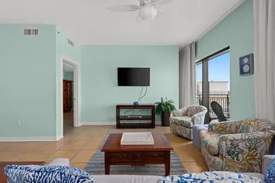 a living room with a couch and a tv at Origin 1602 -PENTHOUSE- 3 Bedroom- Sweeping Gulf in Panama City Beach