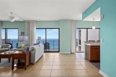 a living room with a couch and a table at Origin 1602 -PENTHOUSE- 3 Bedroom- Sweeping Gulf in Panama City Beach