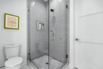 a bathroom with a shower and a toilet at Sunny Side Up by Travel Life Vacations in Santa Rosa Beach
