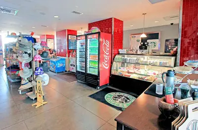a fast food restaurant with a cocacola store at Majestic Beach Towers 2-2107 by Emerald Coast Retreats in Panama City Beach