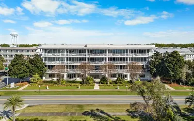 an office building with a road in front of it at Sunset Oasis on 30A in Rosemary Beach