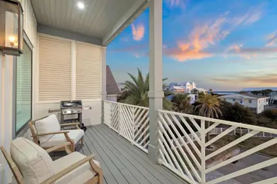 a balcony with a view of the ocean at Gather at the Gulf in Inlet Beach