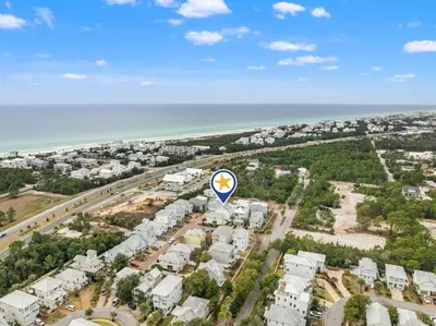 an overhead view of a city and the ocean at 30A Beach House with Golf Cart - Whatcha Dune in Inlet Beach