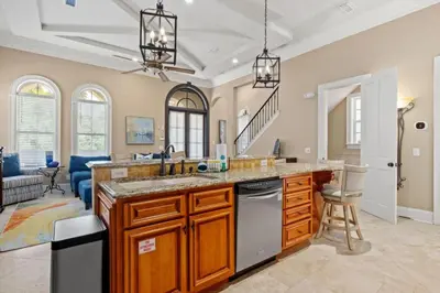 a kitchen with a sink and a counter top at Poseidon's Grotto in Santa Rosa Beach